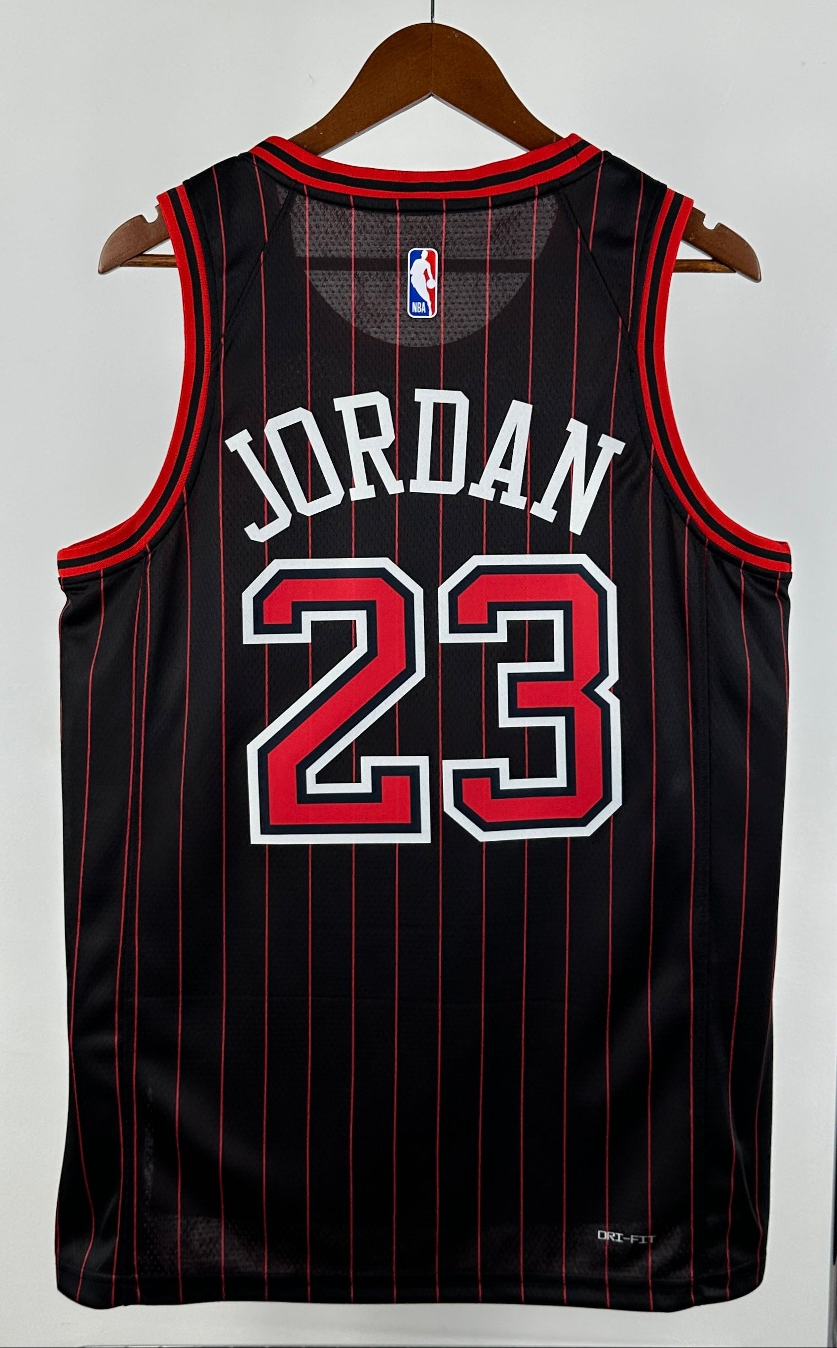 Chicago Bulls — Michael Jordan #23 Statement Edition Jersey (Black Pinstripe)