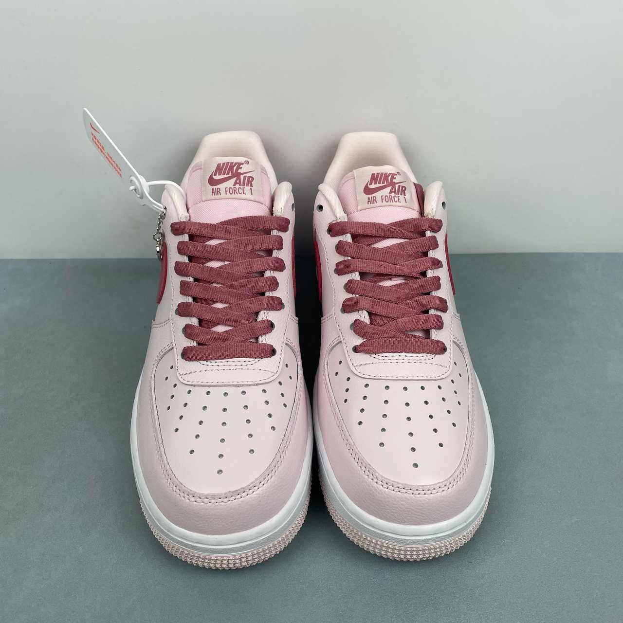 AF1-039 Love Letter Blush Burgundy – rear heel view showing burgundy heel tab with white NIKE AIR branding, pair side by side