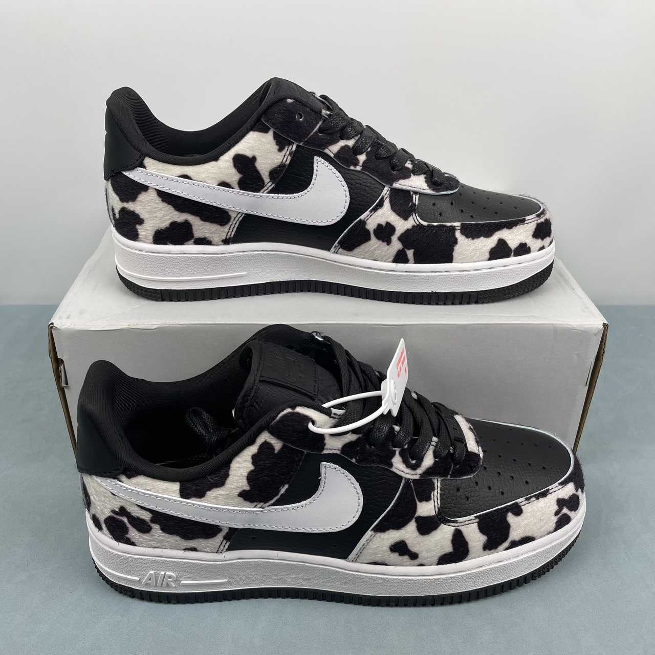 AF1-031 Cow Print Black/White – medial side profile showing AIR midsole text