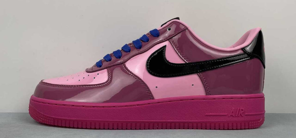AF1-037 Berry Pink Patent – lateral profile alternate angle showing patent leather gloss and royal blue laces