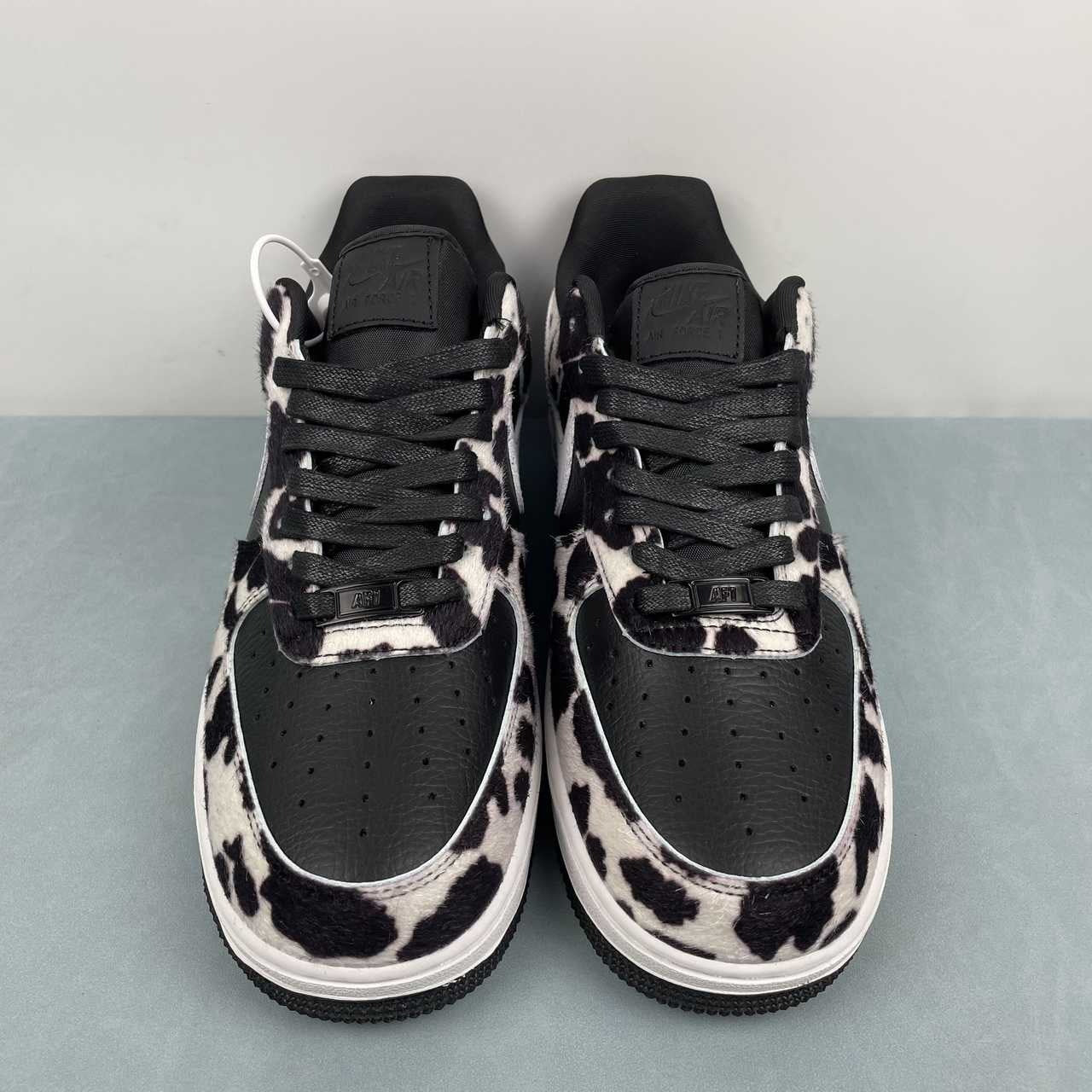 AF1-031 Cow Print Black/White – lateral side profile, pony hair upper with white swoosh
