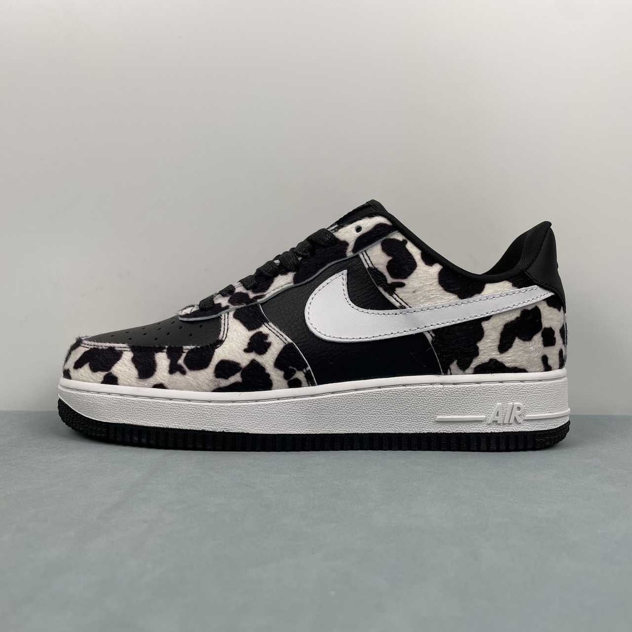 AF1-031 Cow Print Black/White – pair on box, stacked angle
