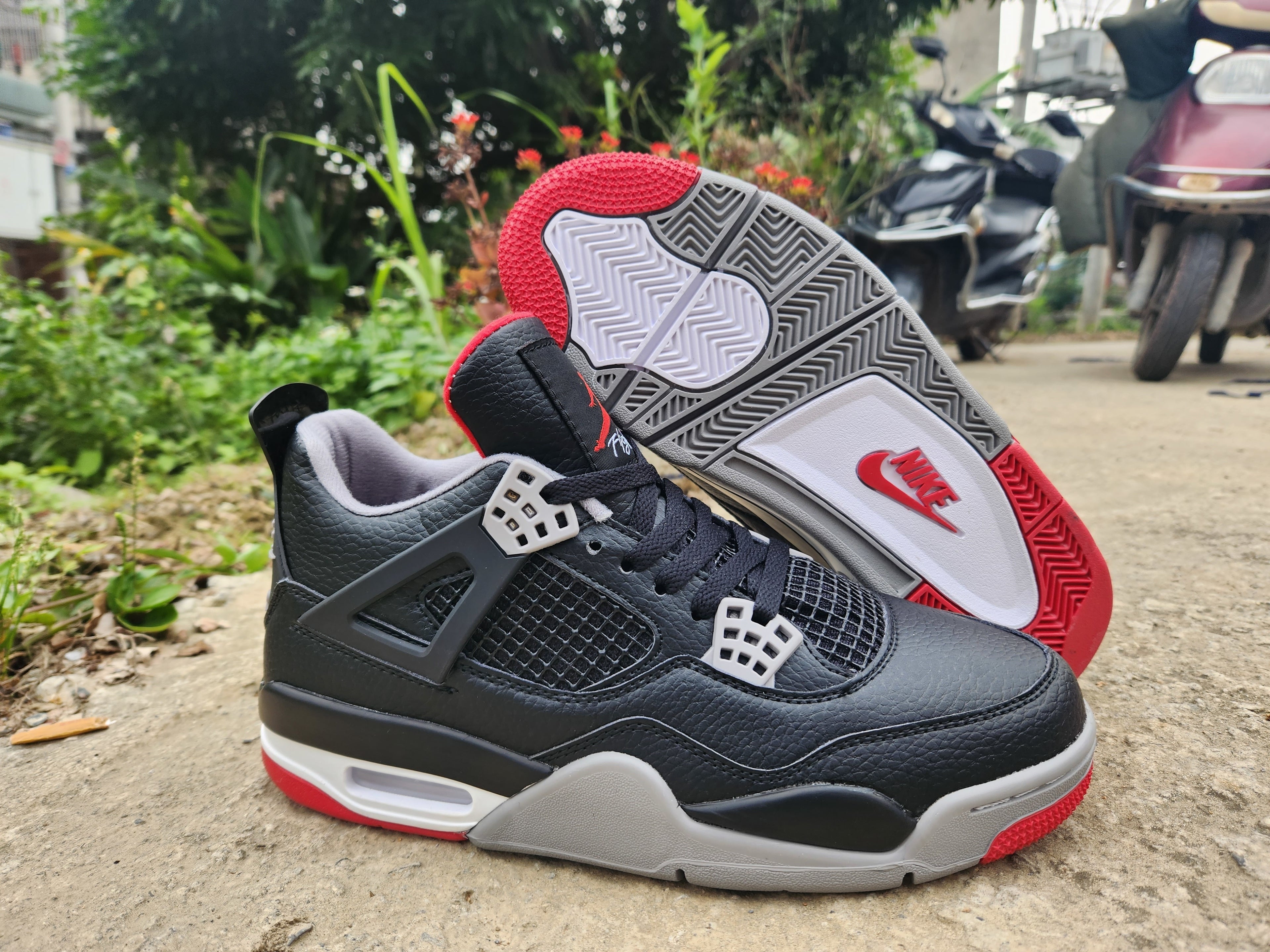 408 — Jordan 4 “Bred Re‑Imagined” — Design‑Inspired Sneaker