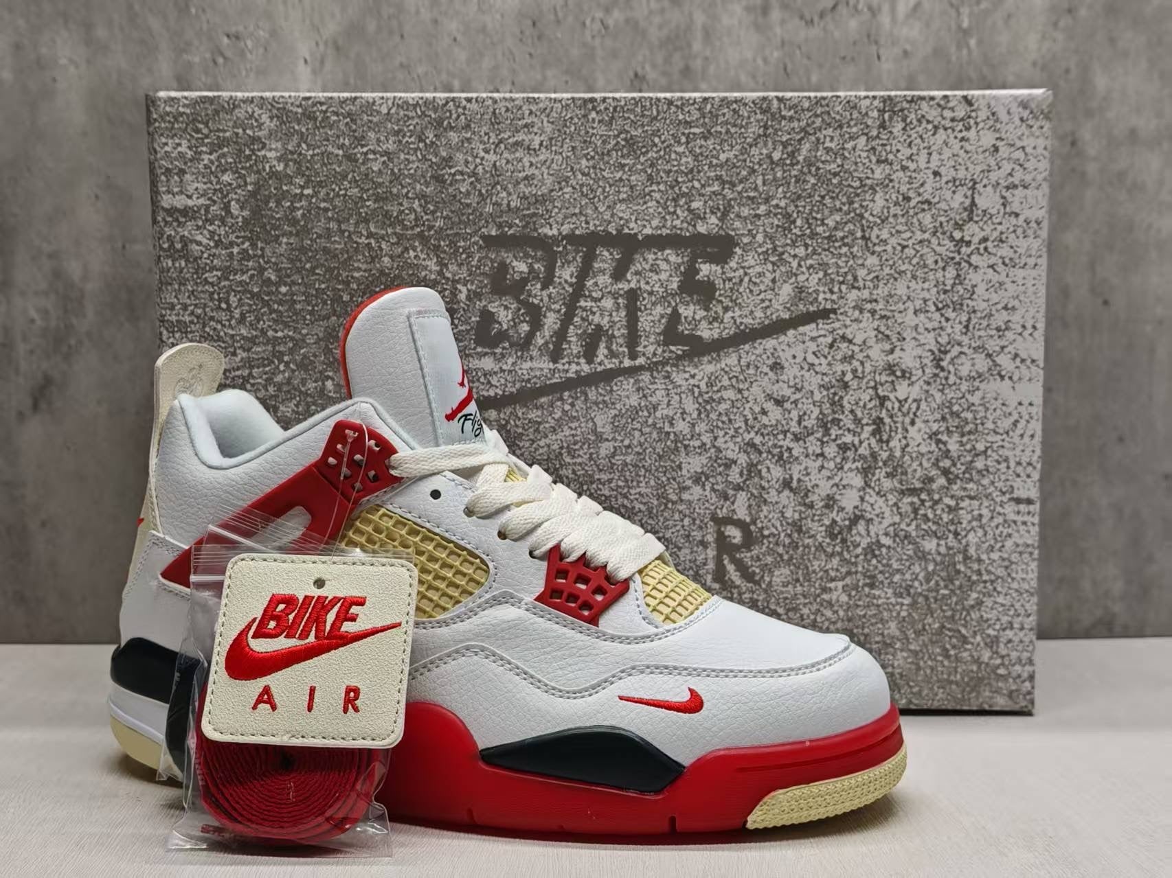 450 — Jordan 4 “Brick After Bricks” — Tribute Custom