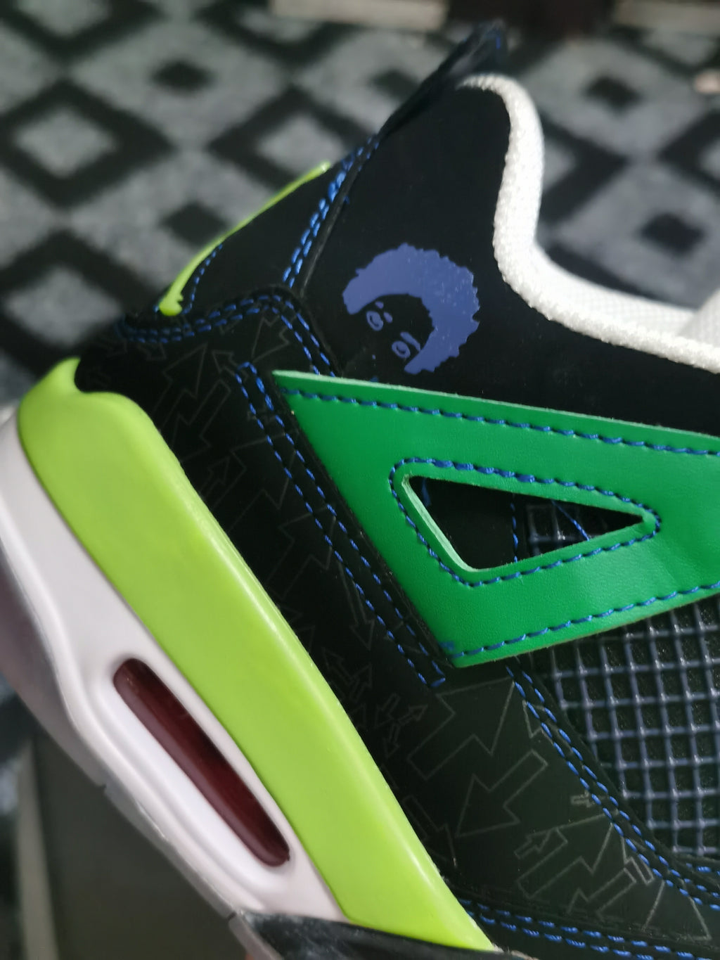 413 — Jordan 4 “Doernbecher” — Design‑Inspired Sneaker