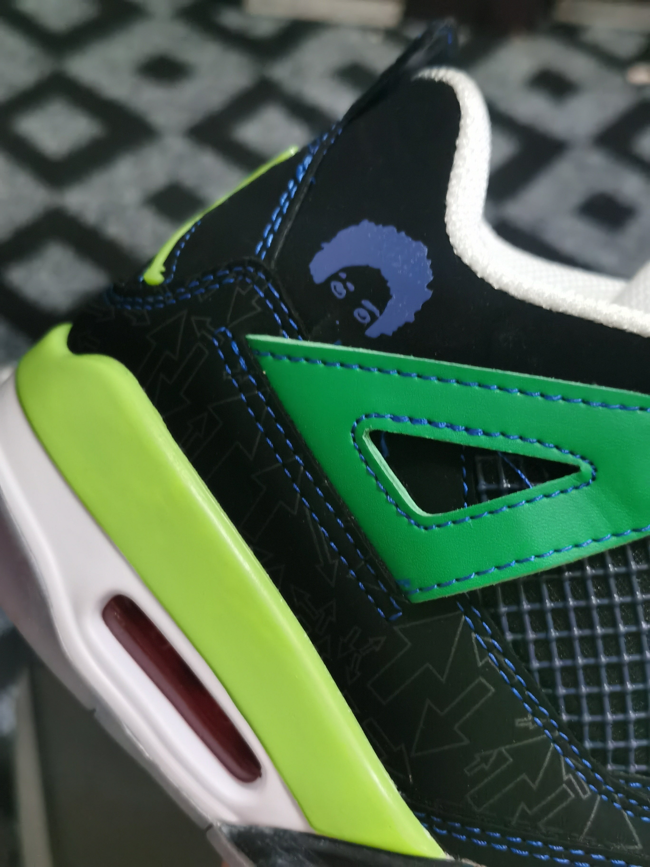 413 — Jordan 4 “Doernbecher” — Design‑Inspired Sneaker