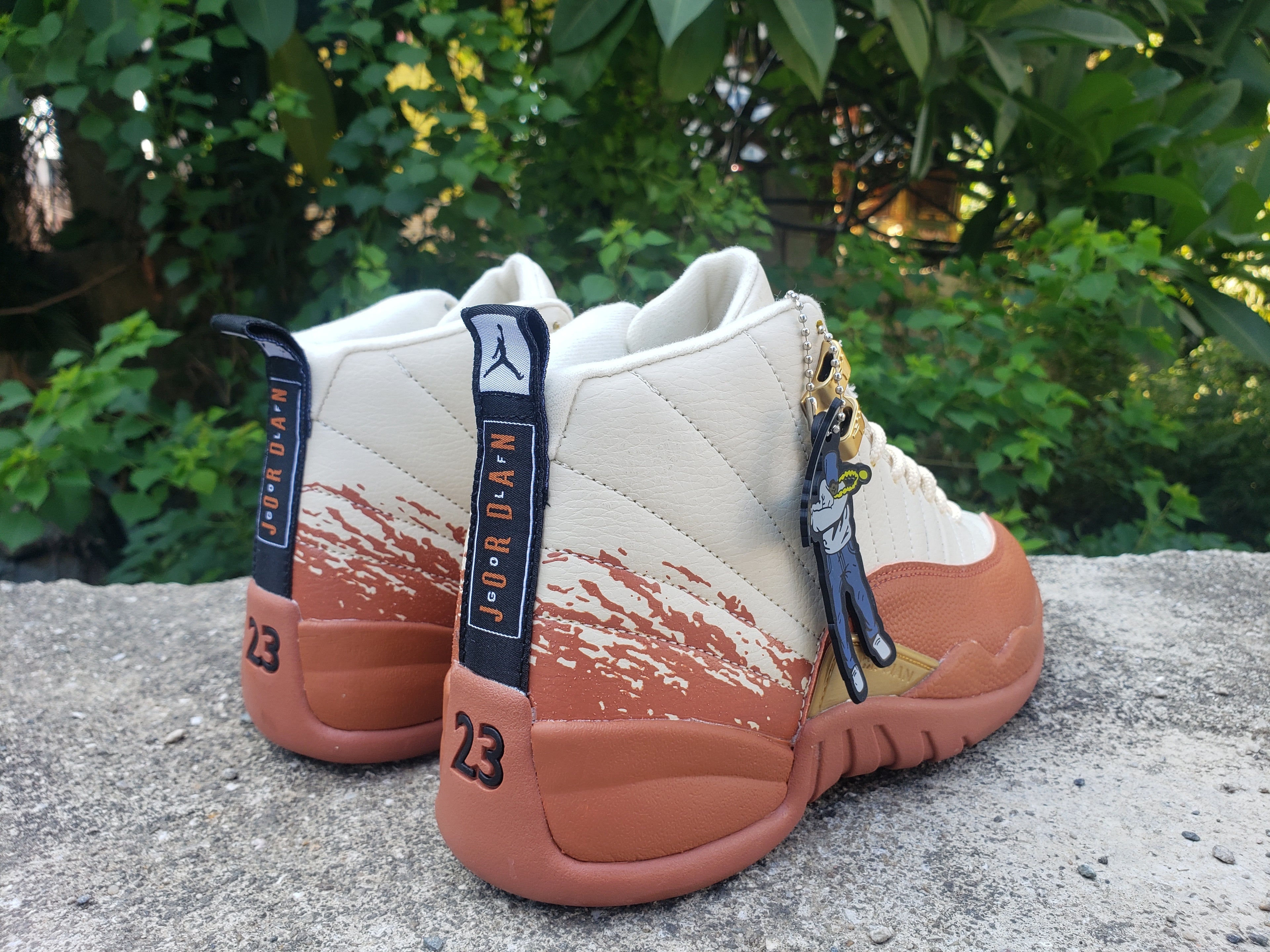 1208 — Jordan 12 “Eastside Golf” — Cream/Orange/Navy — Design‑Inspired