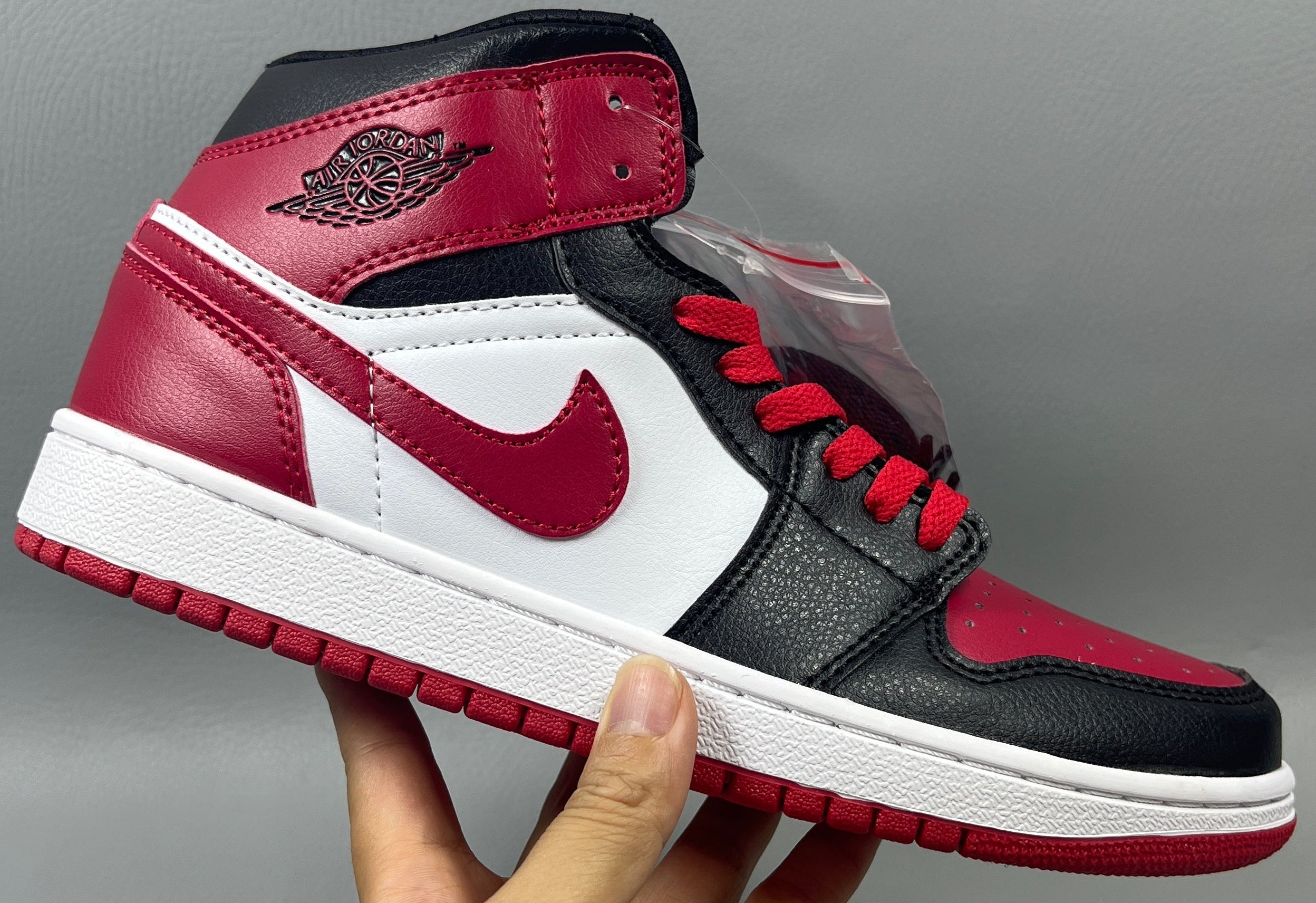 019 — Jordan 1 Mid “Bred Swoosh” — Design-Inspired Sneaker