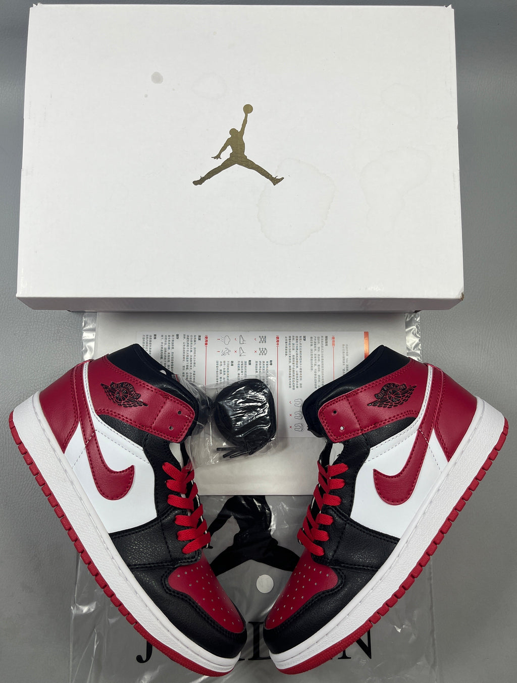 019 — Jordan 1 Mid “Bred Swoosh” — Design-Inspired Sneaker