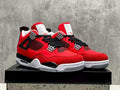 433 — Jordan 4 “Toro Bravo” — Design‑Inspired Sneaker