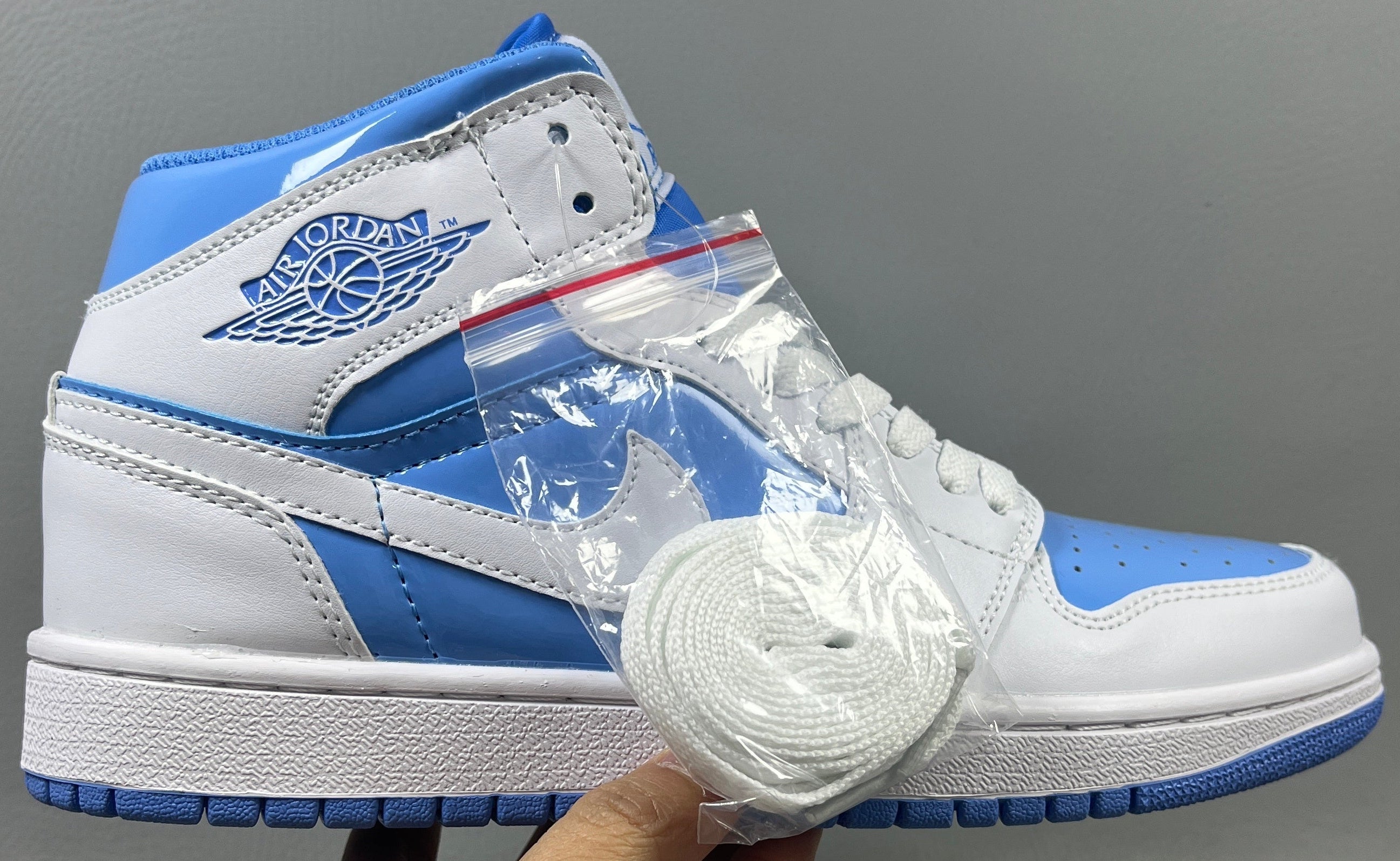 014 — Jordan 1 Mid “Ice Blue Patent” — Design-Inspired Sneaker