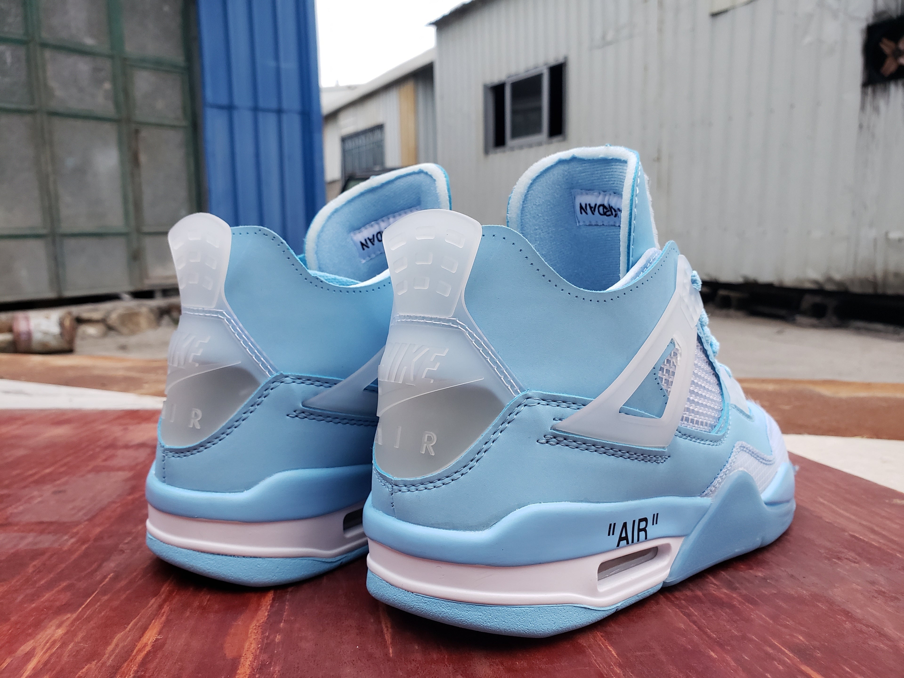 436 — Jordan 4 “Off‑White Carolina Blue” — Design‑Inspired Sneaker