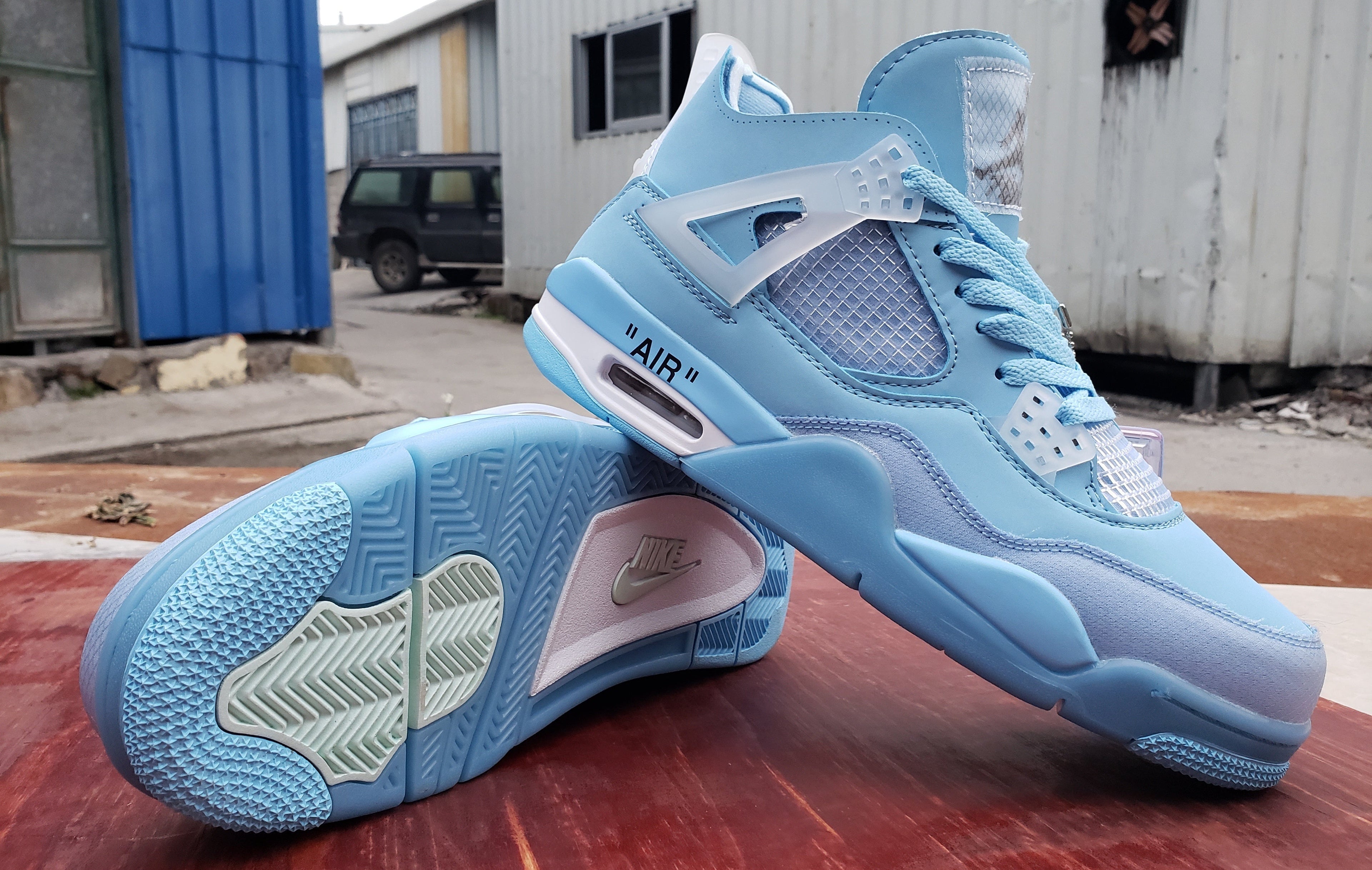 Jordan 4 — Design‑Inspired “Off‑White Carolina Blue” Custom Fantasy Build AJ4‑OWCAROLINA‑436