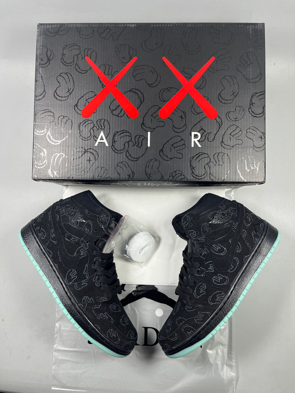039 — Jordan 1 High “KAWS Grey/Black Glow” — Design‑Inspired