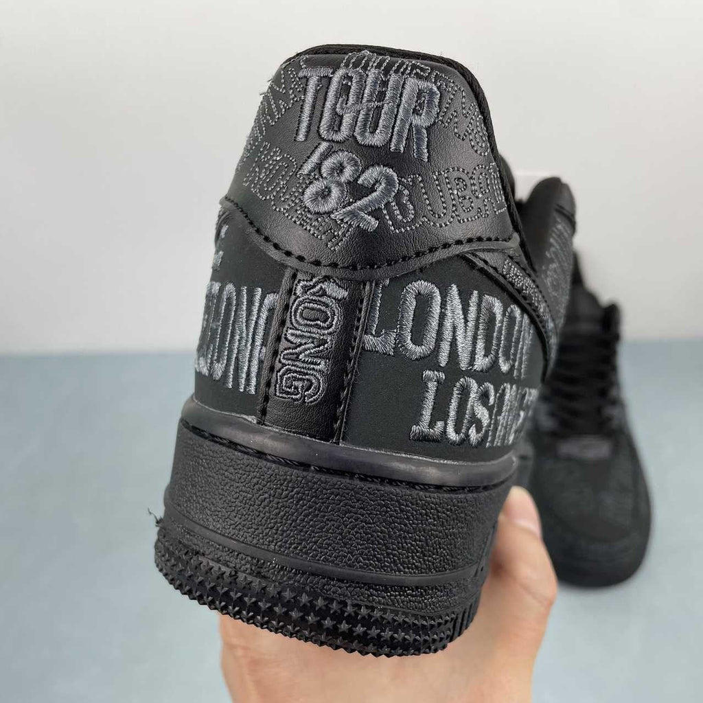 AF1-030 World Tour '82 – lateral side close-up showing Paris embroidery and star-pattern outsole