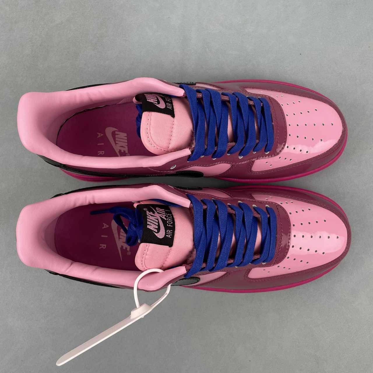 AF1-037 Berry Pink Patent – outsole view showing full monochromatic fuchsia/magenta AF1 tread pattern